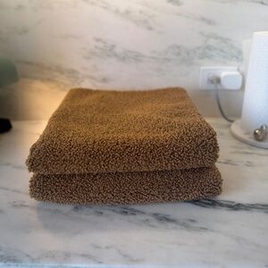 Two Pottery Barn Bouclé Teddy-style textured pillow